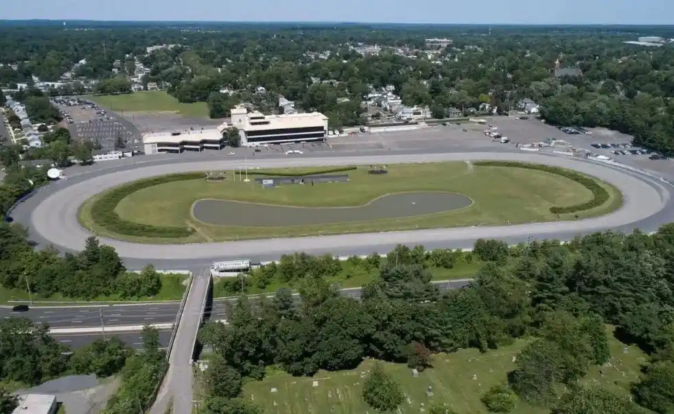 Freehold Raceway sign marking the oldest horse racing track in the United States.