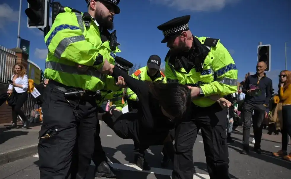 Confronting crowds during the Grand National protest